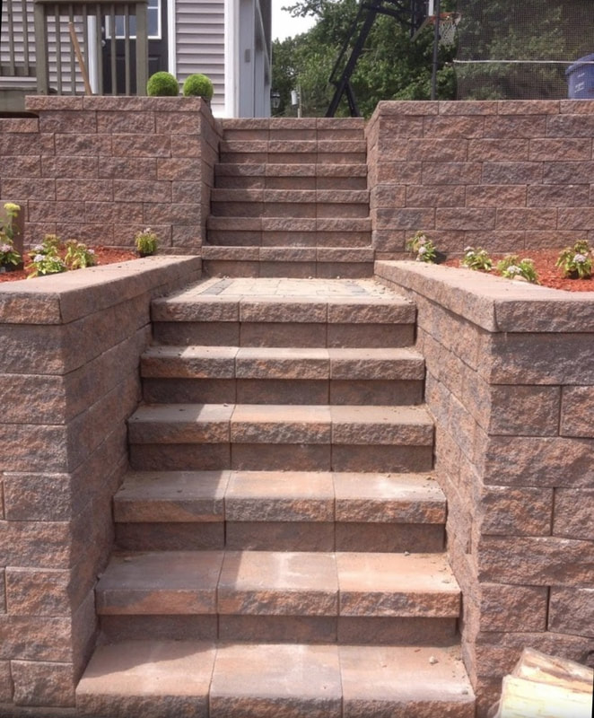 Pavers steps, landscaping and retaining walls