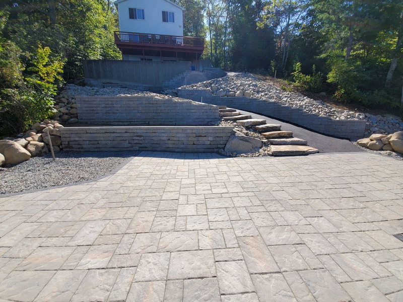large patio with retaining walls and walkways in Farmington CT